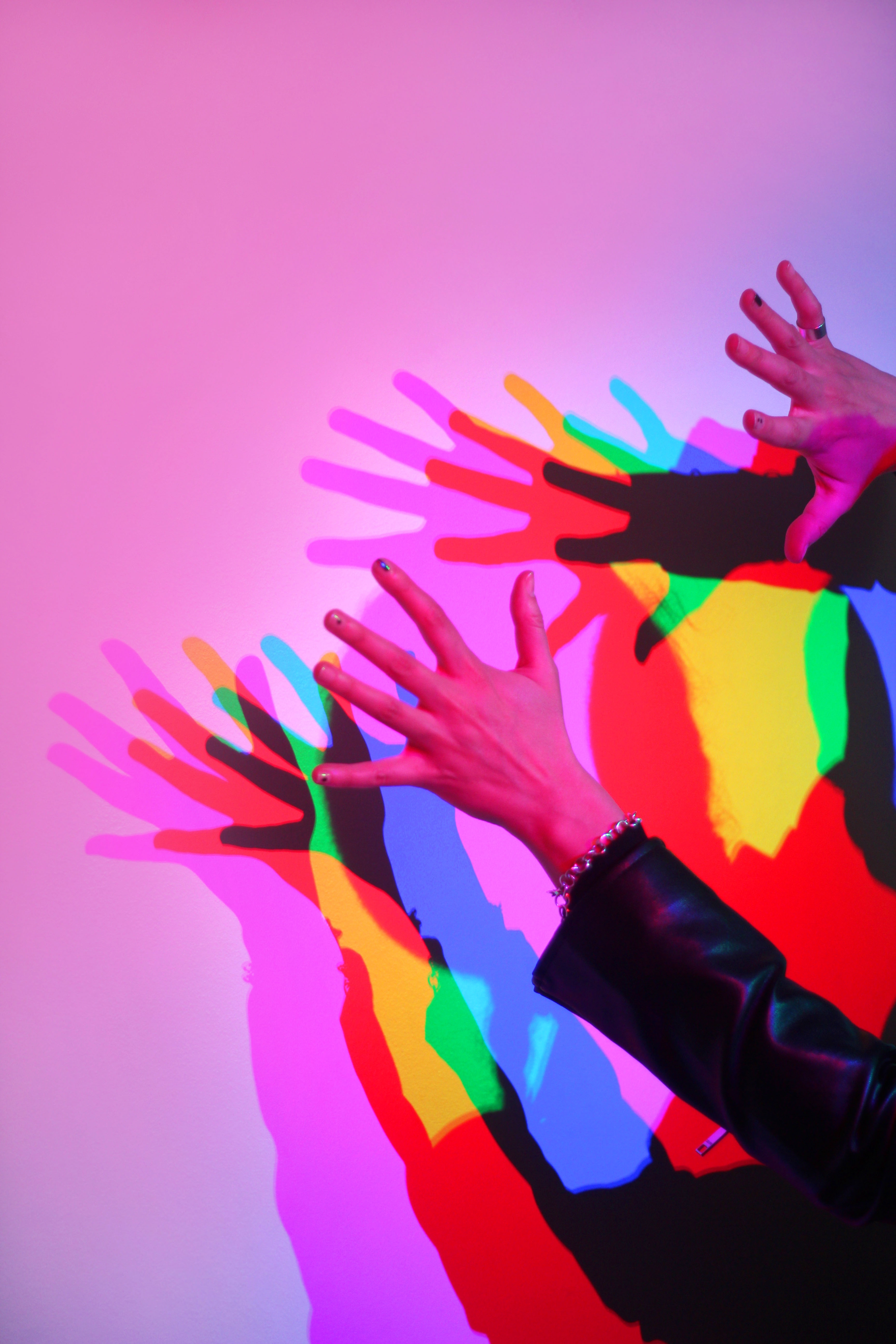 Colourful shadows made by hands