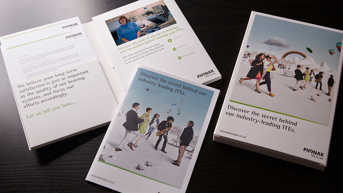 Photo of a direct mail pack for Phonak, produced by Red C Marketing