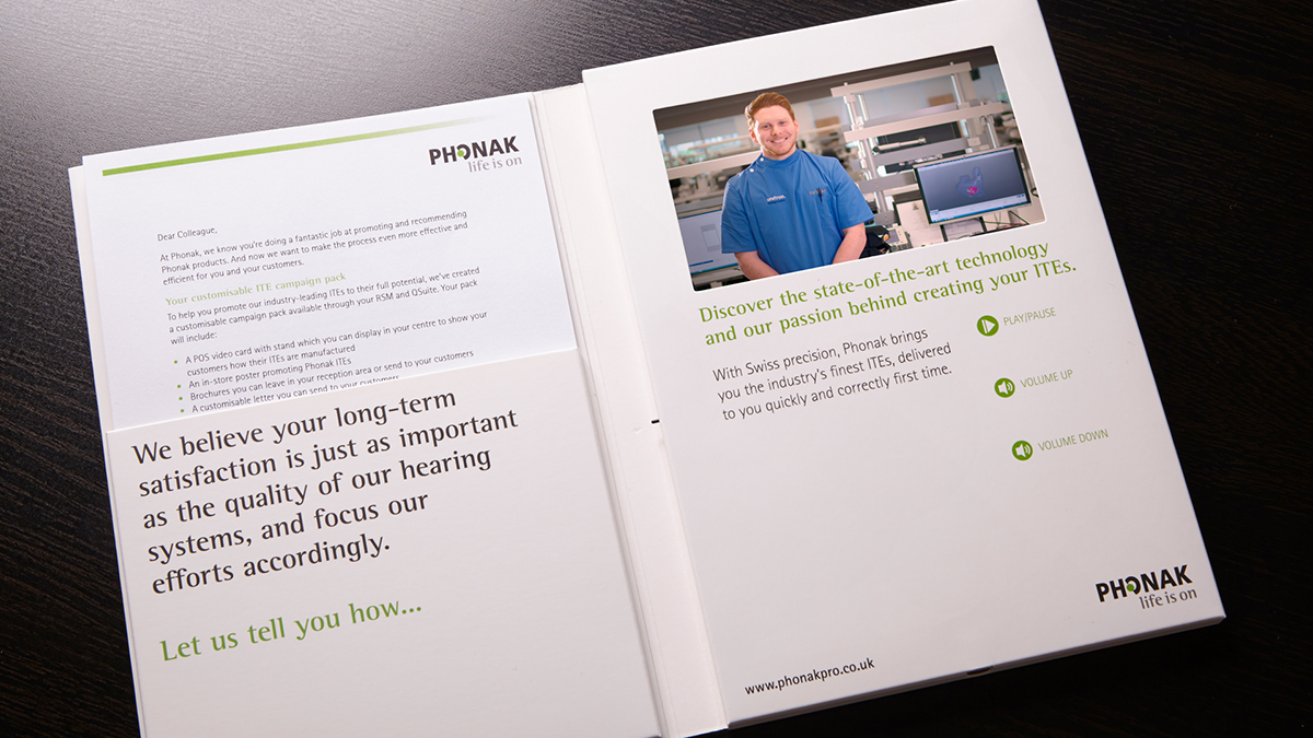 Photo of a direct mail pack for Phonak, produced by Red C Marketing