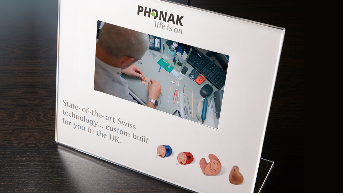 Photo of a direct mail pack for Phonak, produced by Red C Marketing