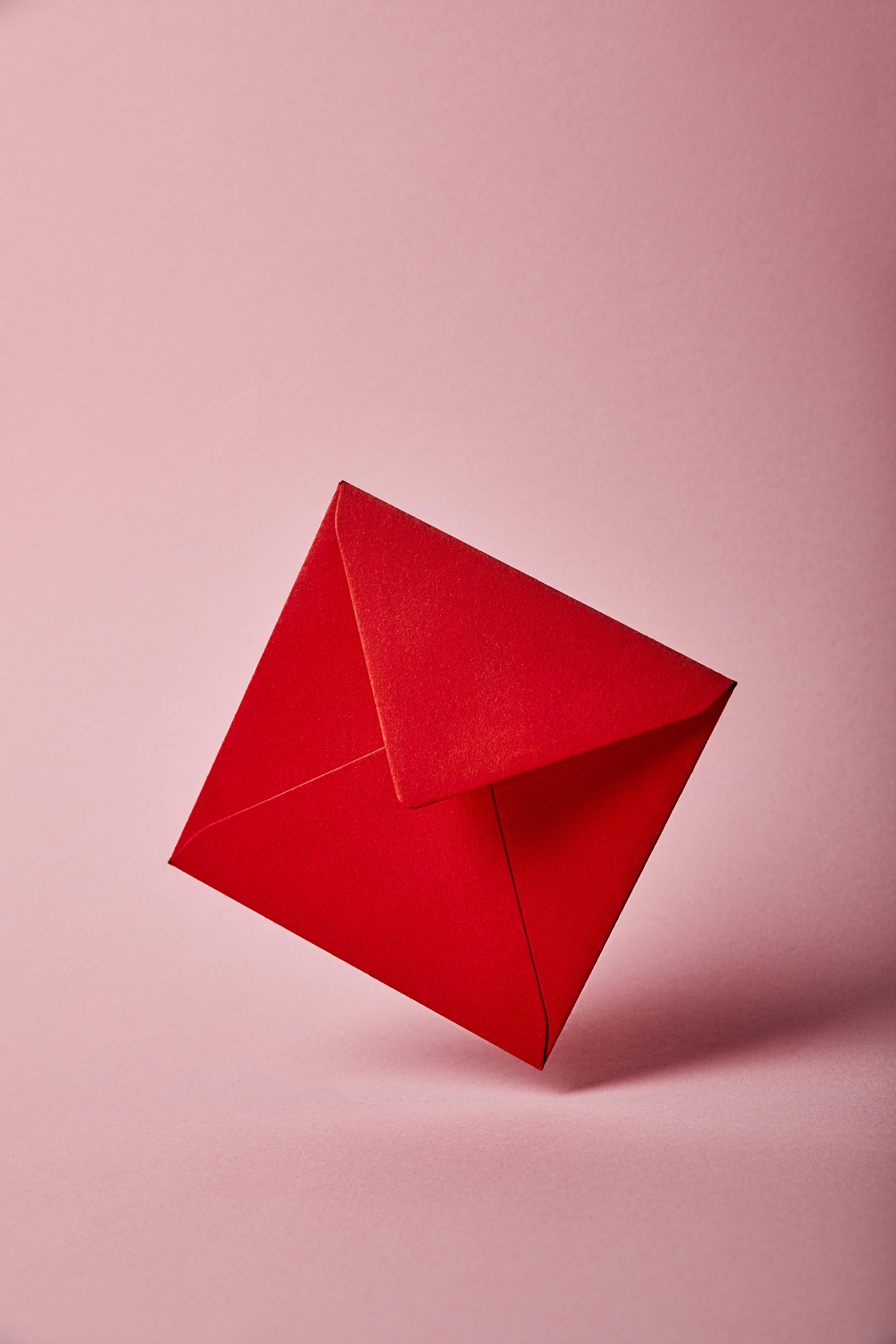 Red envelope on a pink background